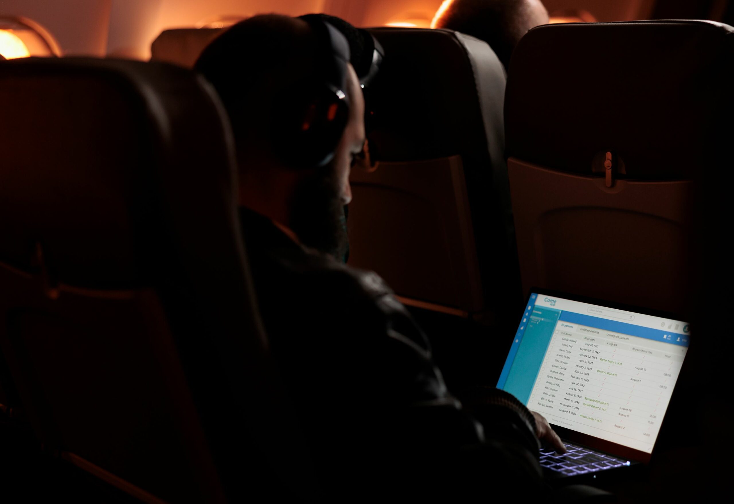 Young Male Traveller Flying With Airplane In Night